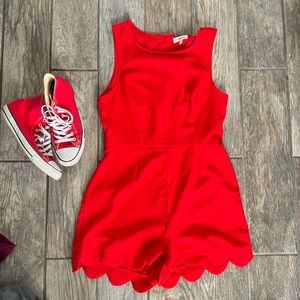 Red romper peek a book back